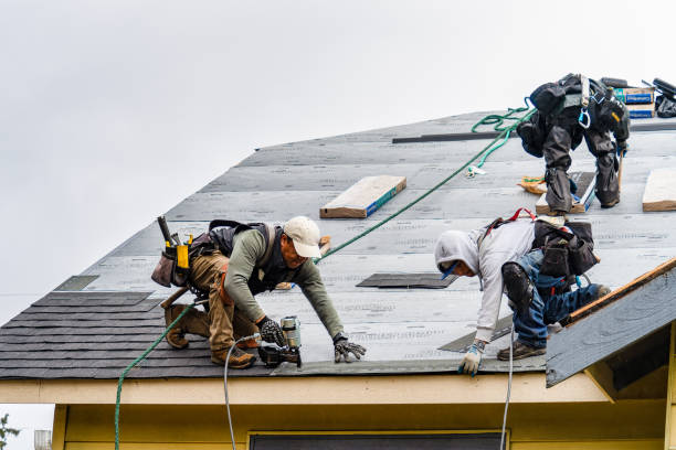 Professional Flat Roof Repair technician working in Lebanon, ME